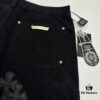 6931a3ebccd8ab3d7af982d0 Chrome Hearts CH Cross Embellished Patchwork Leather Logging Jeans