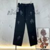 6931a3ebccd8ab3d7af982d5 Chrome Hearts CH Cross Embellished Patchwork Leather Logging Jeans