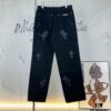 6931a3ebccd8ab3d7af982d6 Chrome Hearts CH Cross Embellished Patchwork Leather Logging Jeans