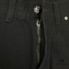 6931a3ebccd8ab3d7af982d8 Chrome Hearts CH Cross Embellished Patchwork Leather Logging Jeans