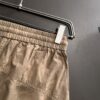 High-End Stone Island 2025 Spring/Summer New Elastic Waist Casual Shorts, Premium Custom Fabric, Breathable and Comfortable, Exquisite Details, Brand Design Concept, Soft and Smooth Texture, Excellent Fit and Tailoring
