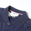 6931a4fdccd8ab3d7af9951e Thom Browne TB Wave Pattern Four-Bar Leather-Look Short Sleeve Polo Shirt