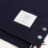 6931a4ffccd8ab3d7af99552 THOM BROWNE TB Red Stripe Woven Crew Neck Short Sleeve T-Shirt in Navy