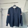 6931a51bccd8ab3d7af99686 THOM BROWNE Fall 2024 New Arrival Tricolor Sleeve Stripe Colorblock Zipper Knit Hooded Jacket, Classic TB Logo Zip-Up Cardigan, Rich and Textured Overall Color, Wool Blend Fabric with Soft Comfort, Contrasting Stripes Add Design Flair – Stylish, Unique, and Versatile Hooded Zip-Up Outerwear