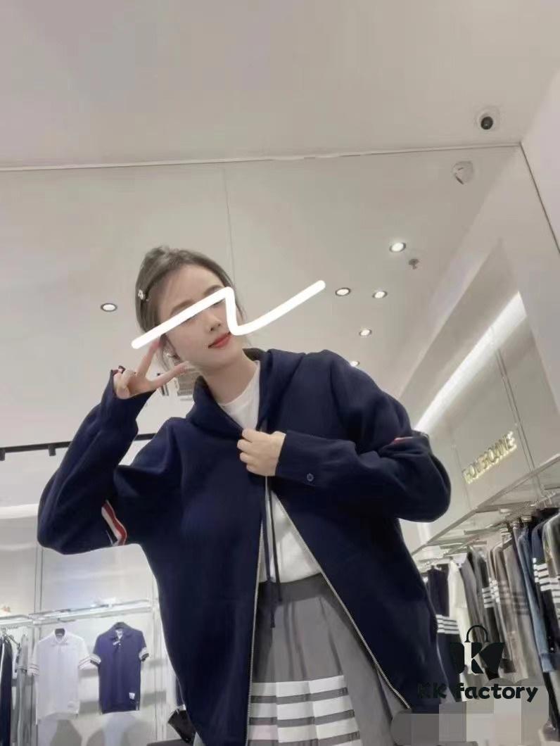 6931a51bccd8ab3d7af9968c THOM BROWNE Fall 2024 New Arrival Tricolor Sleeve Stripe Colorblock Zipper Knit Hooded Jacket, Classic TB Logo Zip-Up Cardigan, Rich and Textured Overall Color, Wool Blend Fabric with Soft Comfort, Contrasting Stripes Add Design Flair – Stylish, Unique, and Versatile Hooded Zip-Up Outerwear