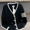 6931a51cccd8ab3d7af996a0 Thom Browne Color-Blocked V-Neck Classic Pocket Logo Mid-Length Knit Cardigan