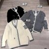 6931a51cccd8ab3d7af996a3 Thom Browne Color-Blocked V-Neck Knit Cardigan with Signature Tape and Classic Pocket, Mid-Length