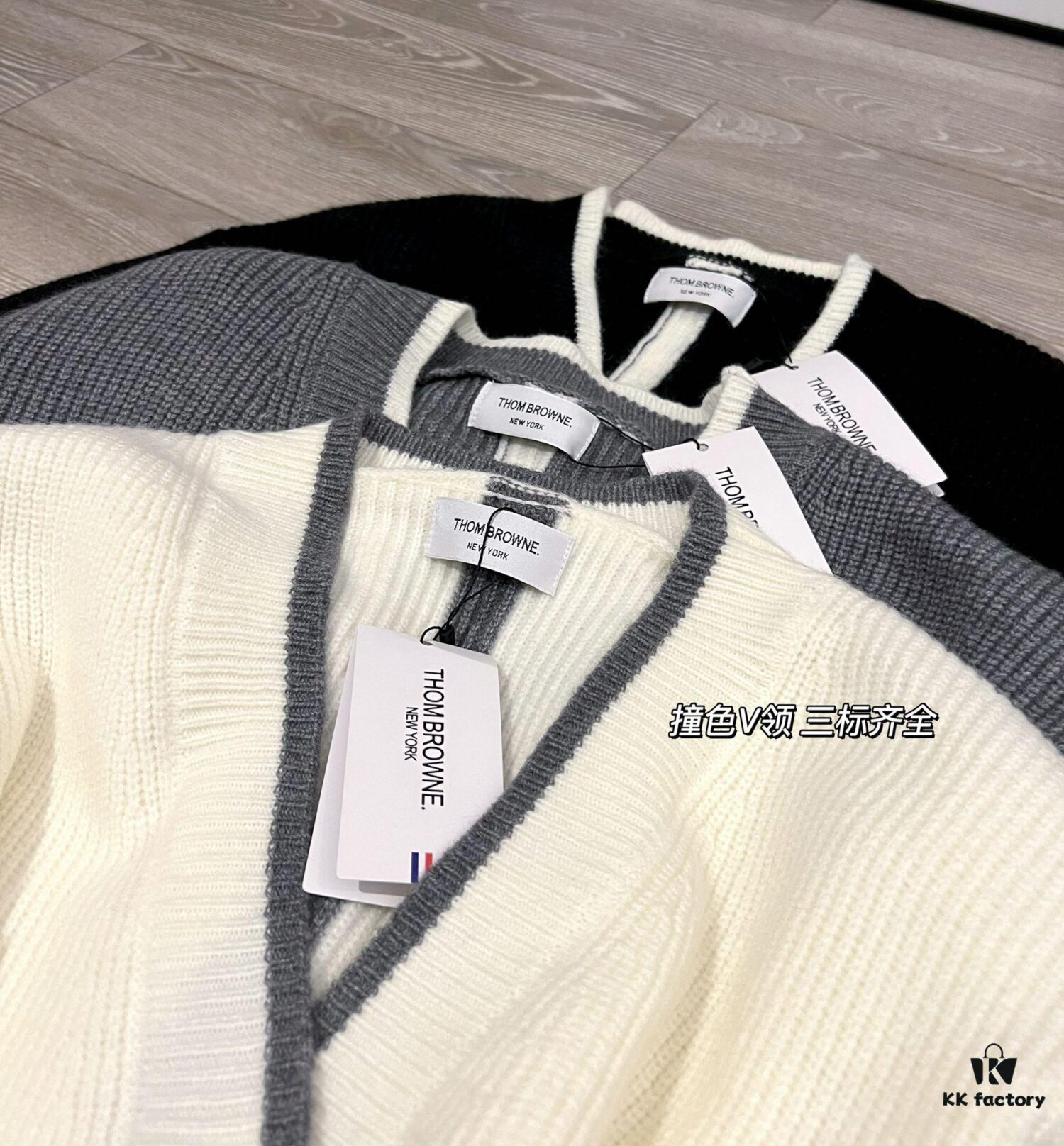 6931a51cccd8ab3d7af996a4 Thom Browne Color-Blocked V-Neck Knit Cardigan with Signature Tape and Classic Pocket, Mid-Length