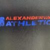 6931a545ccd8ab3d7af99955 Alexander 2025 Distressed Logo Women's T-Shirt
