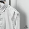 Alexander McQueen Black and White Oversized Shoulder Bow Shirt