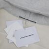 6931a56cccd8ab3d7af99bc7 Alexander Wang 2024 New Arm Logo Embroidered Oversized Hooded Jacket with Dual-Zipper Design