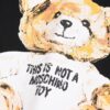 6931a579ccd8ab3d7af99c8c Moschino Print T-Shirt, New Arrival, Minimalist Fashion Design, Pre-Shrunk 100% Cotton Fabric, Approx. 260g Weight, Soft and Skin-Friendly, Unisex Style