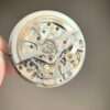 6931a611ccd8ab3d7af9a6d6 Top Custom 4131 Free-Sprung Movement