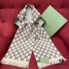 6931a8d8ccd8ab3d7af9d3e5 GUCCI Double-Sided Wool Scarf Classic Small Double G Logo, Khaki and Coffee Color Combination, Unisex Design