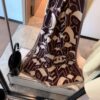6931a902ccd8ab3d7af9d686 Chanel Rare Knit Cashmere Scarf in Soft, Elegant Colorway – A Timeless, Luxurious Statement Piece
