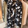 6931a902ccd8ab3d7af9d688 Chanel Rare Knit Cashmere Scarf in Soft, Elegant Colorway – A Timeless, Luxurious Statement Piece