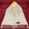6931a927ccd8ab3d7af9d8d5 New Color Fendi Large Fringe Logo Double-Sided Cashmere Scarf FF Monogram in Perfect Autumn-Winter Hue