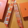 6931a94cccd8ab3d7af9db27 Hermès New Twilly 'Rotating Loop' - Inspired by the 'Rotating Loop' Scarf Design