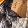 6931a96bccd8ab3d7af9dcef Burberry New Metallic Signature Check Scarf – Versatile, Elegant, and Luxuriously Textured