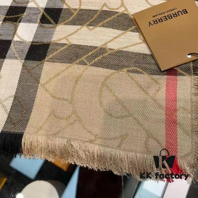 6931a96cccd8ab3d7af9dcff Versatile and Stylish Metallic Logo Plaid Scarf from Bu – New Arrival