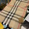 6931a96cccd8ab3d7af9dd00 Versatile and Stylish Metallic Logo Plaid Scarf from Bu – New Arrival