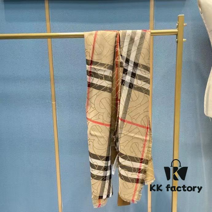 6931a96cccd8ab3d7af9dd03 Versatile and Stylish Metallic Logo Plaid Scarf from Bu – New Arrival