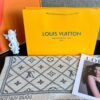 6931a980ccd8ab3d7af9de41 LV Checkered All-Over Double-Sided Cashmere Scarf in Gray