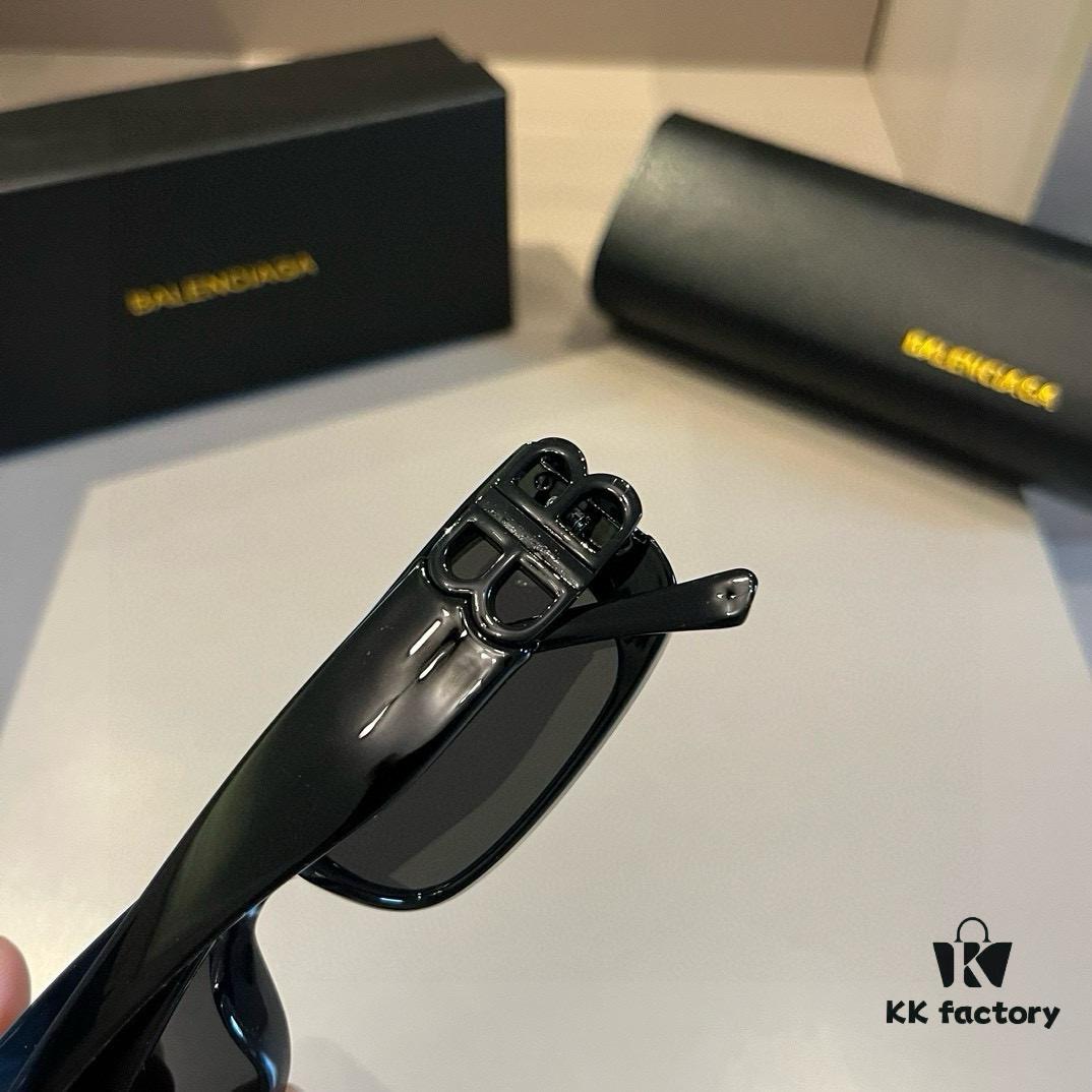 6931a9cfccd8ab3d7af9e350 Balenciaga Black and Gold Sunglasses - The Celebrity-Inspired Stylish Choice