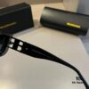 6931a9d0ccd8ab3d7af9e352 Balenciaga Black and Gold Sunglasses - The Celebrity-Inspired Stylish Choice