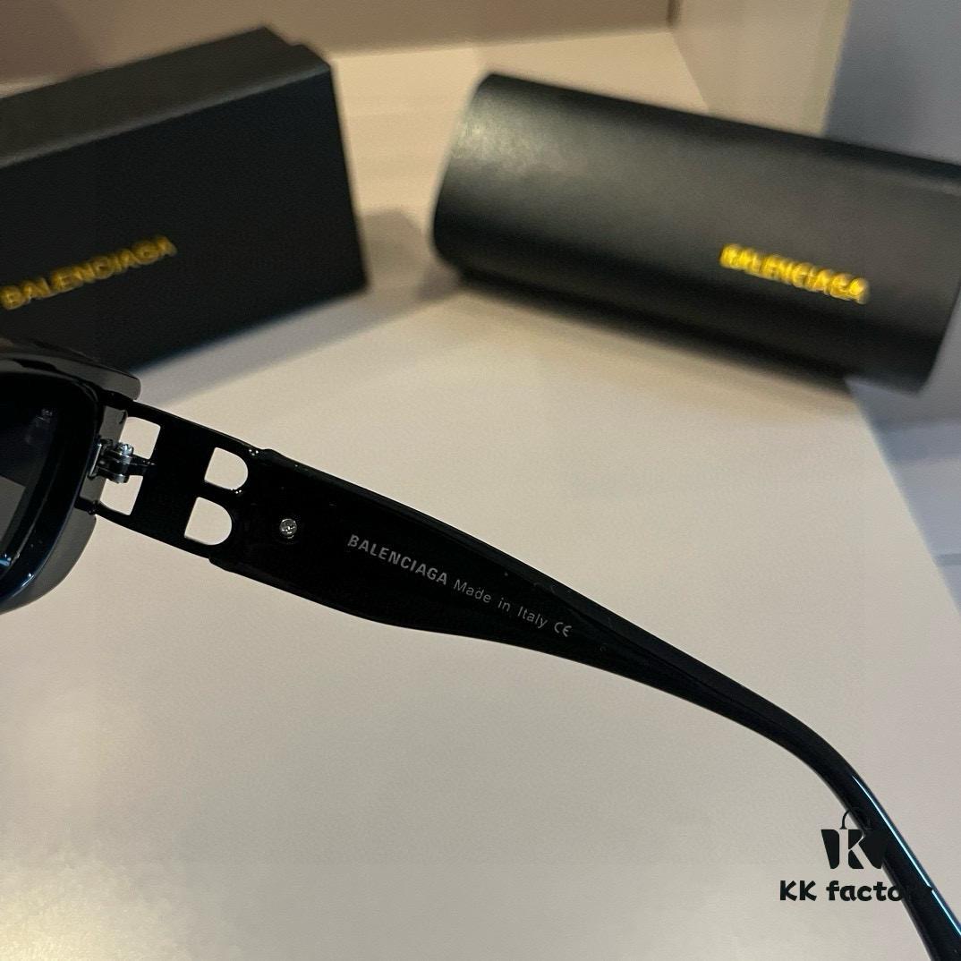 6931a9d0ccd8ab3d7af9e352 Balenciaga Black and Gold Sunglasses - The Celebrity-Inspired Stylish Choice