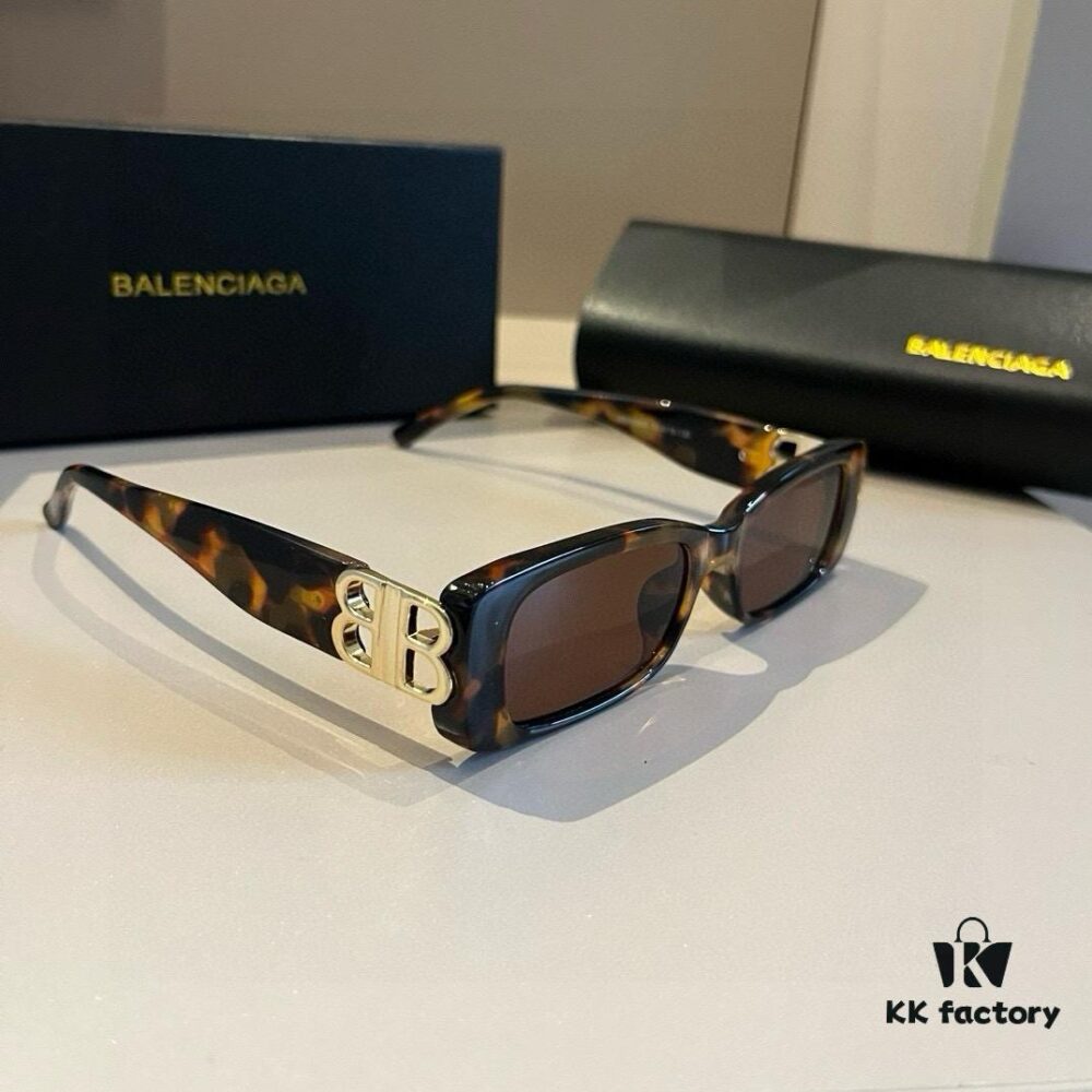 6931a9d0ccd8ab3d7af9e355 Balenciaga Black-Gold Aviator Sunglasses with Double B Logo