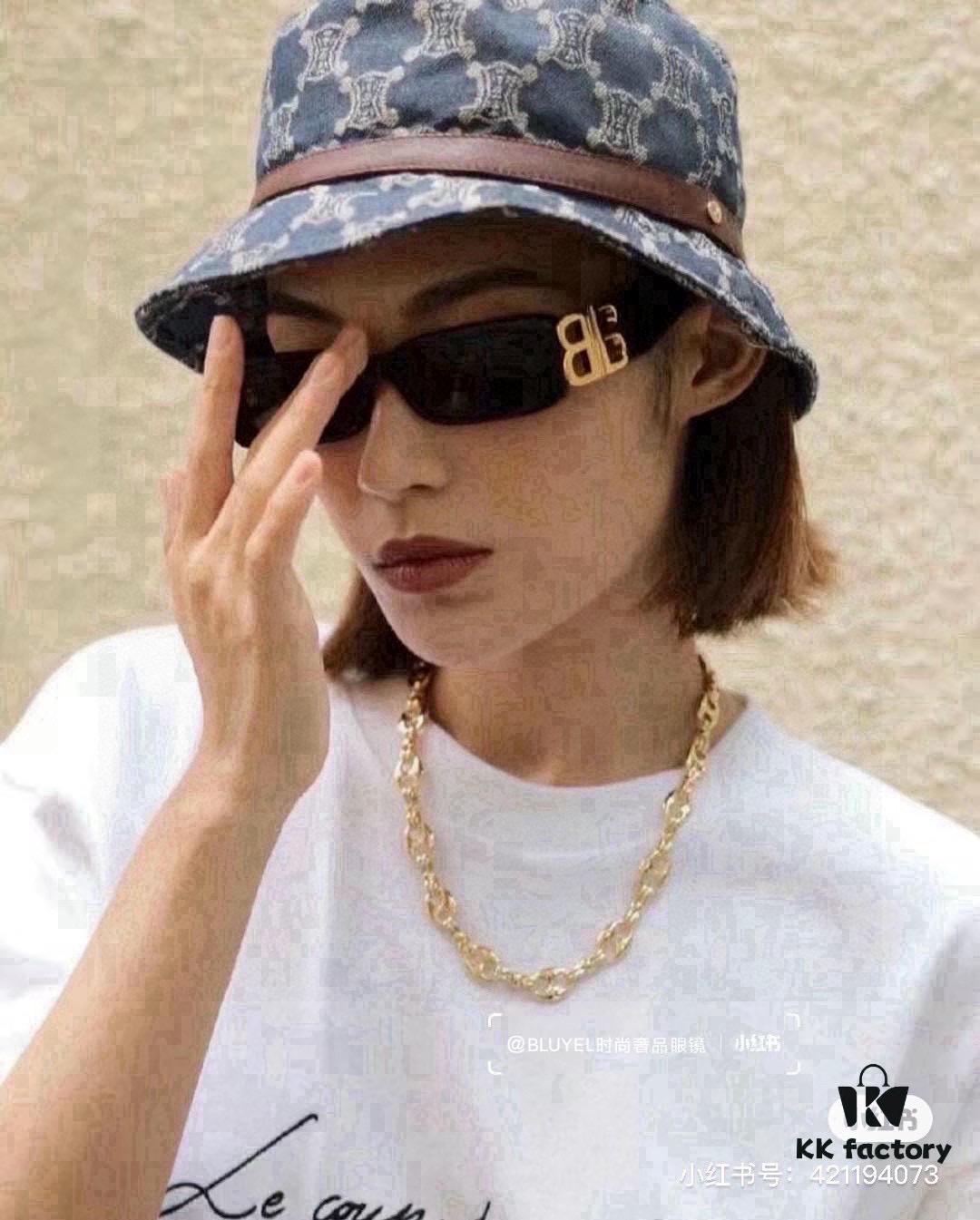 6931a9d3ccd8ab3d7af9e38b Balenciaga Black-Gold Aviator Sunglasses with Double B Logo