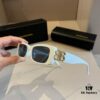 6931a9d4ccd8ab3d7af9e396 Balenciaga Black and Gold Sunglasses with Double B Logo