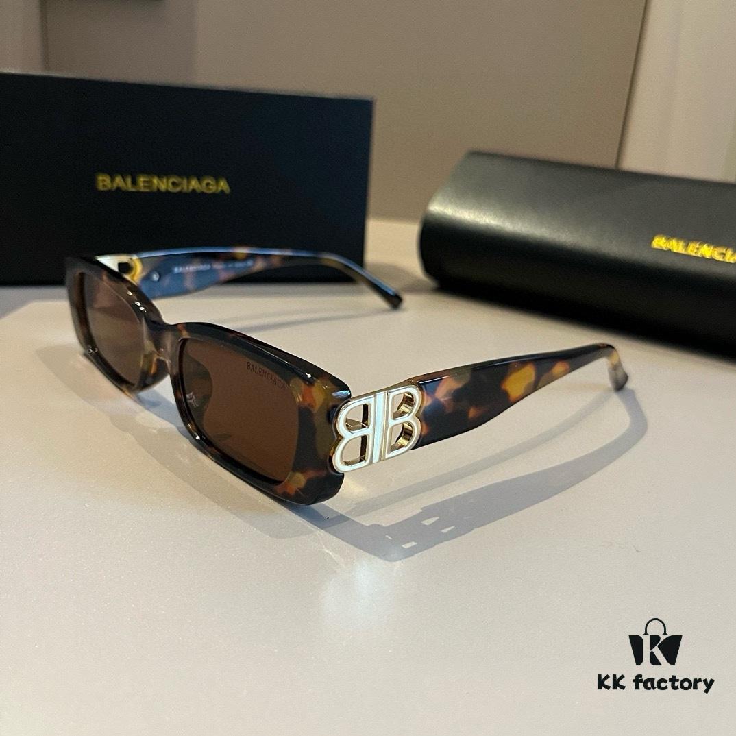 6931a9d6ccd8ab3d7af9e3bd Balenciaga Black-Gold Aviator Sunglasses with Double B Logo
