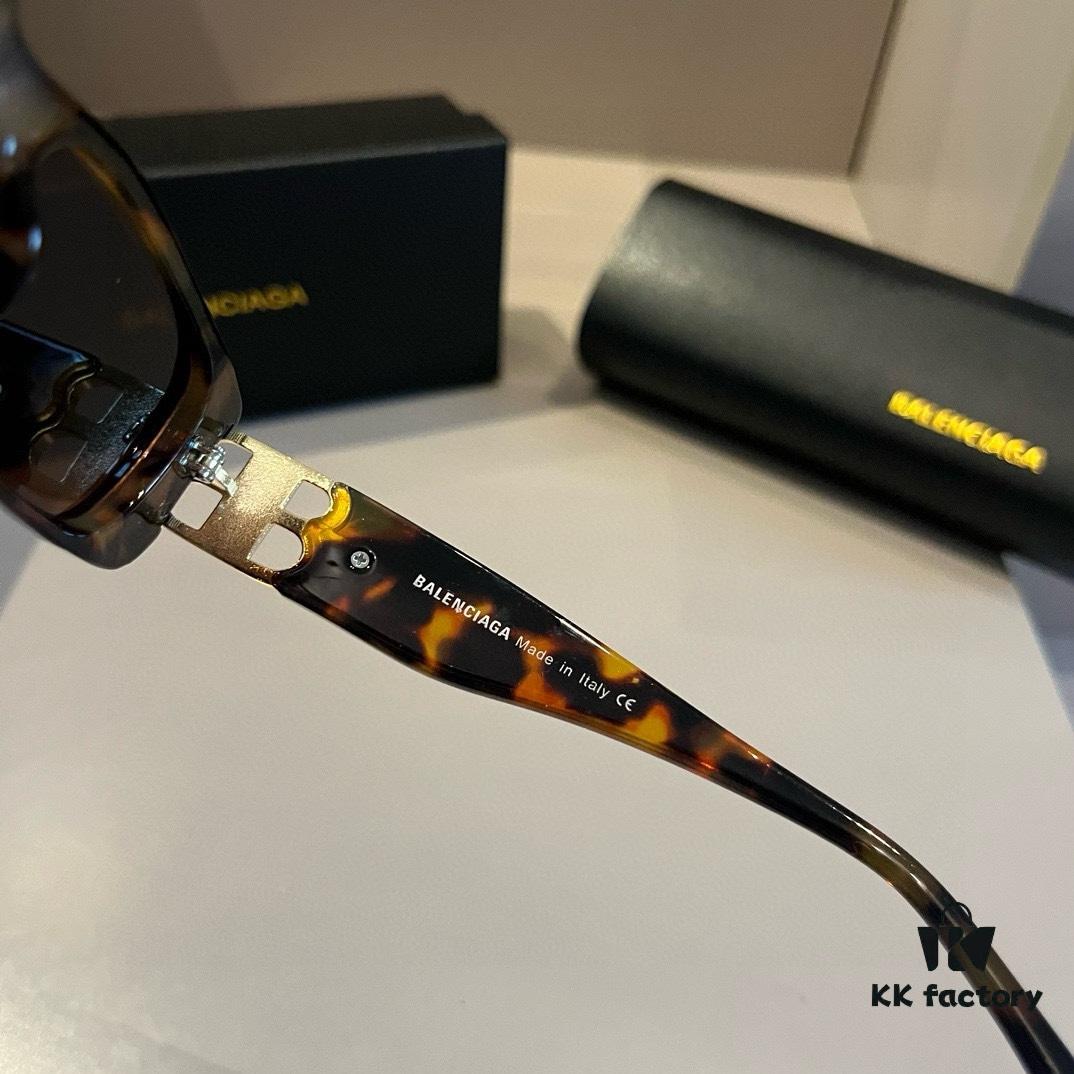 6931a9d7ccd8ab3d7af9e3c4 Balenciaga Black-Gold Aviator Sunglasses with Double B Logo