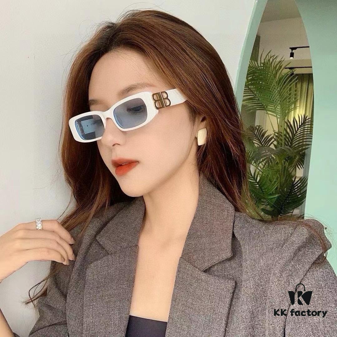 6931a9d7ccd8ab3d7af9e3c5 Balenciaga Black and Gold Sunglasses with Double B Logo, Retro Lightweight Frame