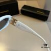 6931a9d7ccd8ab3d7af9e3ca Balenciaga Black and Gold Sunglasses with Double B Logo, Retro Lightweight Frame