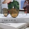 6931af77ccd8ab3d7afa375d LOUIS VUITTON Round Frame Sunglasses with Detailed Design, Original LV Rimless Style, Classic Temple Logo, High-Quality Fashion Eyewear