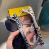 6931f4b03a89a121ed5467af Fendi Polarized Metal Women's Sunglasses