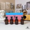 6931f5063a89a121ed546c6e Louis Vuitton LV Black Bottle Limited Edition Travel Set of Four 30ml x 4 with Sprayers, Including Night Fire, Floating Shadow, Saabo Rose, Pure Oud