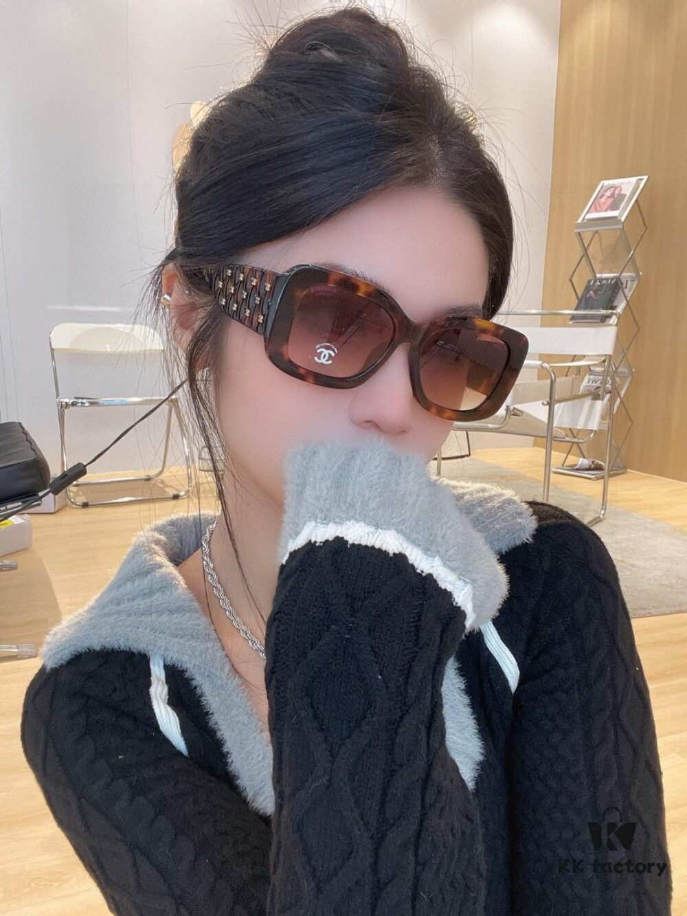 6931f82a3a89a121ed549794 CHANEL New Classic Black and White Sunglasses with Logo-Embellished Temples