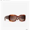 CHANEL New Classic Black and White Sunglasses with Logo-Embellished Temples