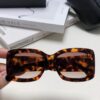 CHANEL New Classic Black and White Sunglasses with Logo-Embellished Temples