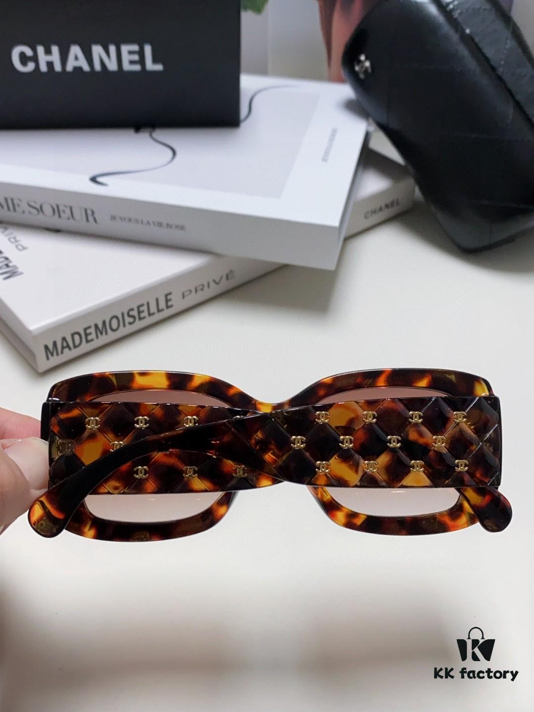 CHANEL New Classic Black and White Sunglasses with Logo-Embellished Temples