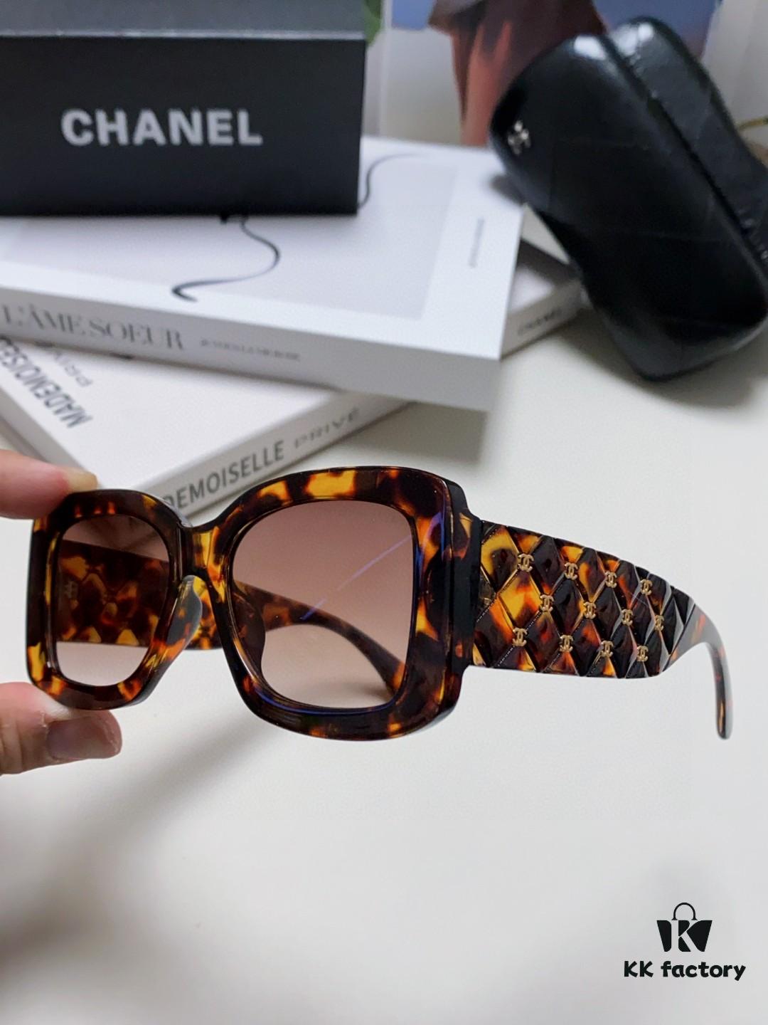 CHANEL New Classic Black and White Sunglasses with Logo-Embellished Temples