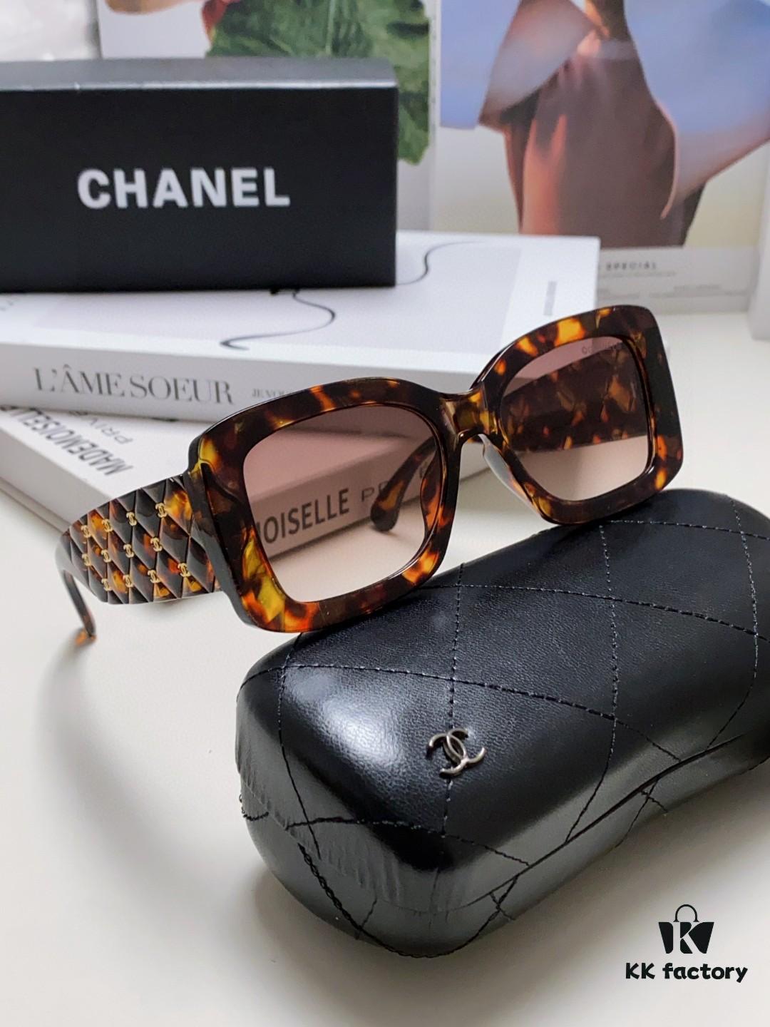 CHANEL New Classic Black and White Sunglasses with Logo-Embellished Temples