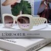 6931f82b3a89a121ed5497a0 CHANEL New Classic Black and White Sunglasses with Logo-Embellished Temples