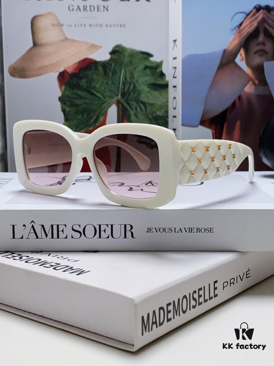 6931f82b3a89a121ed5497a0 CHANEL New Classic Black and White Sunglasses with Logo-Embellished Temples