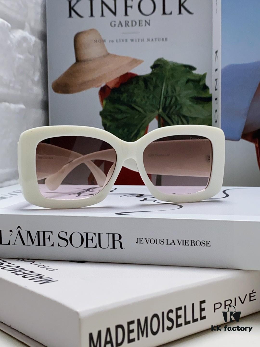 6931f82b3a89a121ed5497a1 CHANEL New Classic Black and White Sunglasses with Logo-Embellished Temples