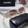 6931f82c3a89a121ed5497a7 CHANEL New Classic Black and White Sunglasses with Logo-Embellished Temples